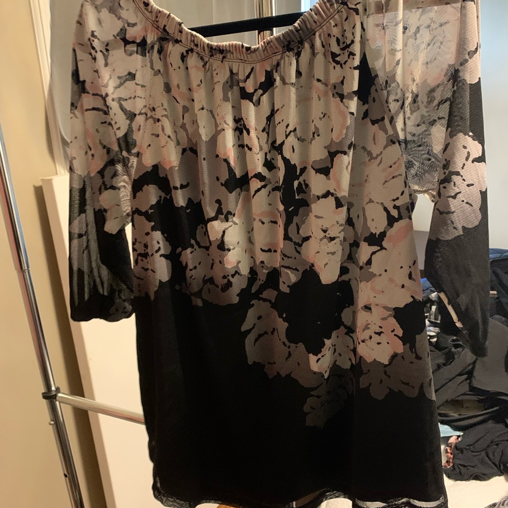 3/$30 Pretty blouse with floral design and 3/4 sleeves.